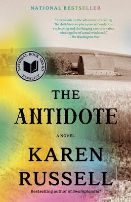 Vintage paperback of The Antidote, a novel with a colorful cover and detailed artwork, lying flat on a white surface.