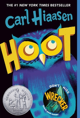 Paperback copy of "Hoot" by Yearling Books featuring a colorful cover illustration of a young boy and a cute owl.