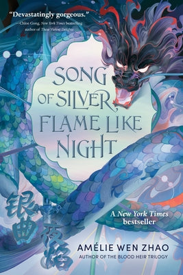 Paperback of Song of Silver, Flame Like Night by Random House Children's Books, showing the book cover with dark and fiery design elements.