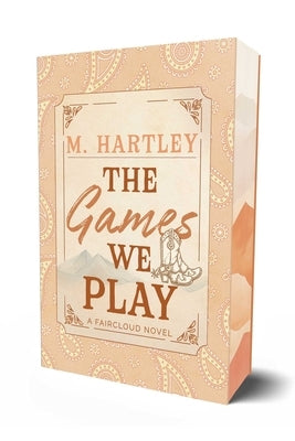 Paperback copy of "The Games We Play" by Page & Vine showing the book cover with title and author name.