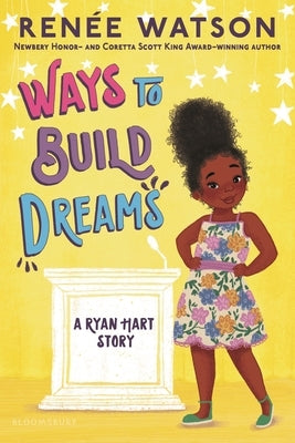 Paperback copy of "Ways to Build Dreams" by Bloomsbury Publishing featuring the book cover with colorful illustrations.