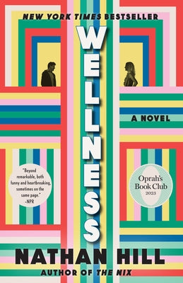 Vintage Wellness paperback book with colorful cover open to pages, featuring illustrations and text on health and well-being.