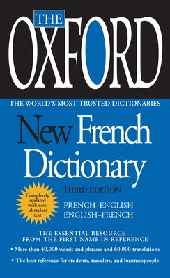 Mass market paperbound of The Oxford New French Dictionary, Third Edition by Berkley Books with open pages showing French-English entries.