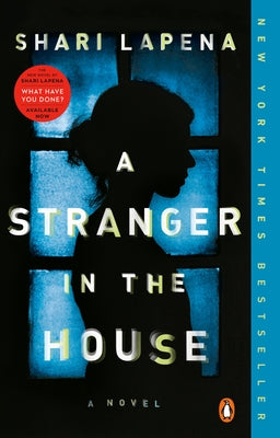 Paperback of A Stranger in the House by Penguin Books, showing the book cover with a mysterious illustration.