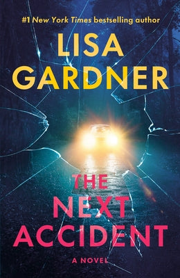 Paperback of "The Next Accident" novel by Bantam, featuring a book cover with abstract artwork and bold title text.