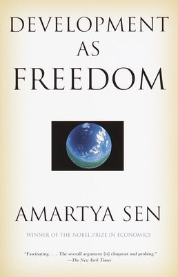 Paperback copy of "Development as Freedom" by Anchor Books, showing the book's cover with title and author details.