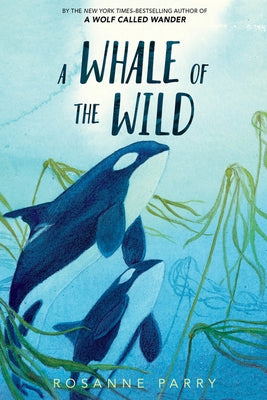 Paperback copy of "A Whale of the Wild" by Greenwillow Books, featuring colorful whale-themed cover art.