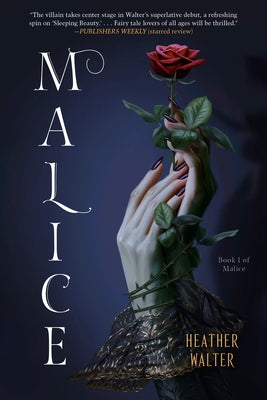 Paperback copy of "Malice" by Del Rey Books featuring the book cover with dark, intriguing artwork and bold title text.