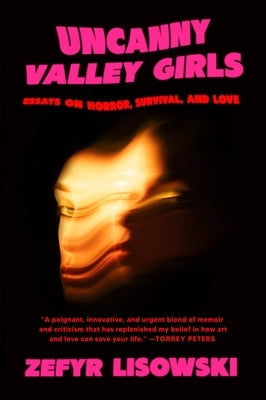 Paperback book titled "Uncanny Valley Girls: Essays on Horror, Survival, and Love" by Harper Perennial, with cover art visible.