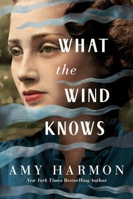 Paperback of "What the Wind Knows" by Lake Union Publishing featuring a cover with a vintage-style illustration and soft color palette.
