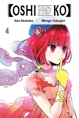 Paperback manga volume 4 of Oshi No Ko by Yen Press, featuring colorful cover art and characters from the series.