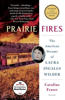 Paperback of Prairie Fires: The American Dreams of Laura Ingalls Wilder by Picador USA, showing the book cover with title and artwork.