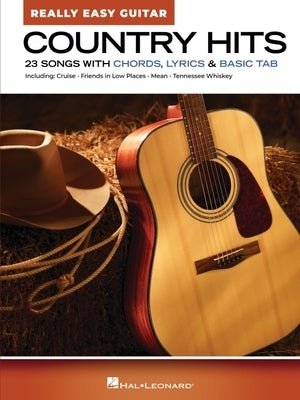 Paperback book titled "Country Hits - Really Easy Guitar" by Hal Leonard Publishing, showing a cover with guitar chords and song titles.