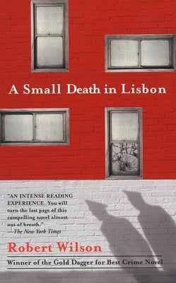 Mass market paperbound of "A Small Death in Lisbon" by Berkley Books, showing the book cover with title and author details.