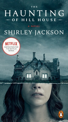 Mass market paperback of The Haunting of Hill House by Penguin Books, featuring a dark, eerie cover design.