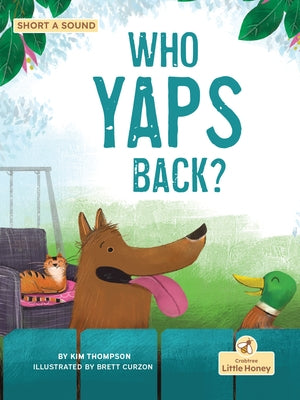 Paperback of "Who Yaps Back?" by Crabtree Publishing Company, featuring colorful cover art with playful dog illustrations.
