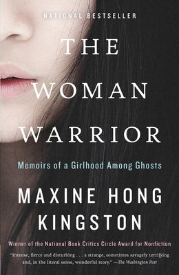 Paperback copy of "The Woman Warrior" memoir by Maxine Hong Kingston, published by Vintage Books USA, featuring a cover image.