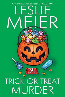 Paperback copy of Trick or Treat Murder by Kensington Cozies, featuring a spooky cover design.
