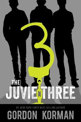 Paperback copy of The Juvie Three by Little, Brown Books for Young Readers, showing the book cover with colorful illustrations.