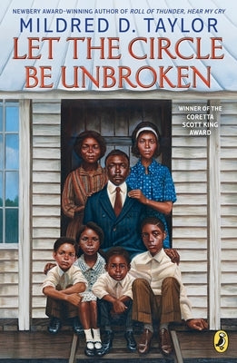 Paperback copy of "Let the Circle Be Unbroken" by Puffin Books, featuring the book cover with colorful illustrations.