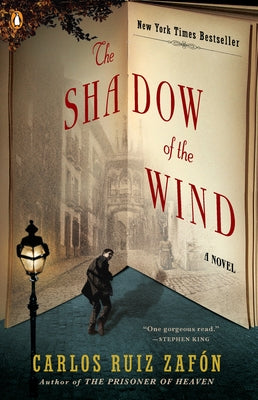 Paperback of The Shadow of the Wind novel by Penguin Publishing Group, featuring a dark-themed cover design.
