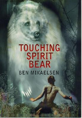 Paperback of Touching Spirit Bear by HarperCollins, showing the book cover with artwork and title on the front.