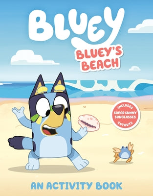Paperback activity book featuring Bluey, with colorful beach scenes and fun activities from Penguin Young Readers Licenses.