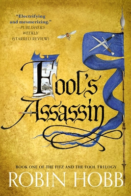 Paperback of Fool's Assassin, first book in The Fitz and the Fool Trilogy, by Random House Worlds, showing the cover with fantasy artwork.