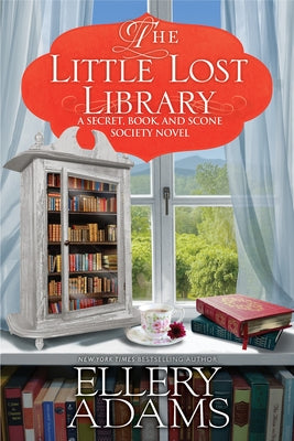 Paperback copy of The Little Lost Library by Kensington Cozies featuring a colorful cover with whimsical library illustrations.