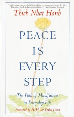 Paperback of "Peace is Every Step: The Path of Mindfulness in Everyday Life" by Bantam, showing the book cover with serene design.