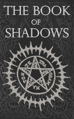 Paperback of The Book of Shadows with white, red, and black magic spell symbols from Createspace Independent Publishing Platform.