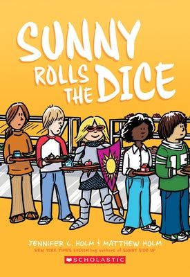 Paperback copy of Sunny Rolls the Dice: A Graphic Novel (Sunny #3) by Graphix, showing colorful comic book cover art.