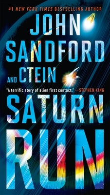 Cover of the mass market paperback "Saturn Run" by G.P. Putnam's Sons, featuring a science fiction space scene with planets and stars.