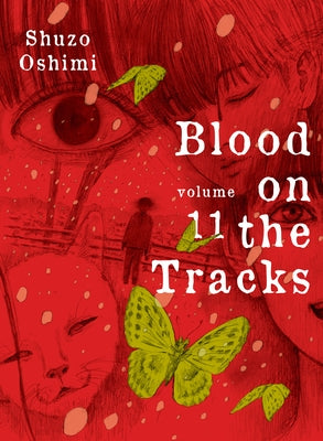 Paperback of Blood on the Tracks 11 manga by Vertical Comics, featuring cover art with dark, expressive illustrations.