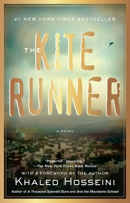 Paperback copy of The Kite Runner novel by Riverhead Books featuring a cover with artwork and title on the front.