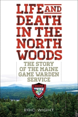 Paperback book titled "Life and Death in the North Woods" by Down East Books, featuring a forest scene on the cover.