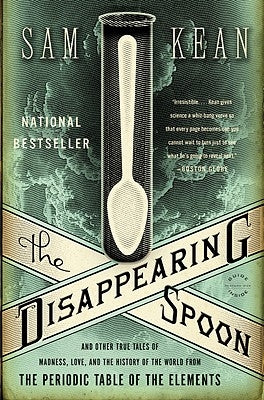 Paperback of The Disappearing Spoon by Back Bay Books featuring a colorful cover with images related to the periodic table of elements.