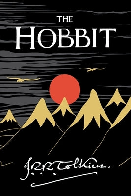 Paperback copy of The Hobbit: Or There and Back Again by William Morrow & Company, showing the book cover with fantasy artwork.