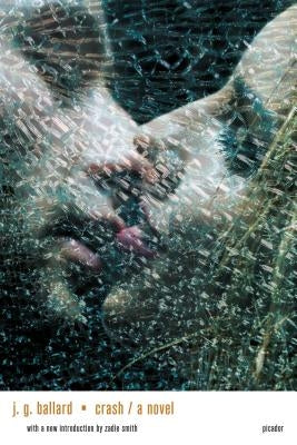 Paperback copy of the novel "Crash" by Picador USA, showing the book's front cover with bold title and author name.