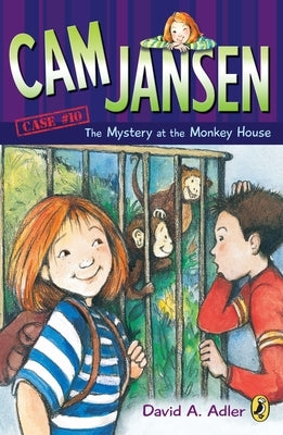 Paperback copy of Cam Jansen: The Mystery of the Monkey House by Puffin Books, showing the front cover with illustrations.