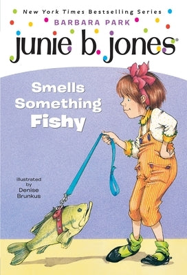 Paperback of Junie B. Jones #12 "Junie B. Jones Smells Something Fishy" by Random House Books for Young Readers, showing the book cover.