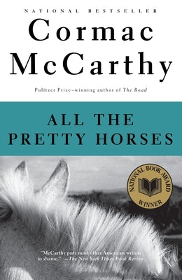Paperback copy of All the Pretty Horses from the Border Trilogy by Vintage, featuring a book cover with a western landscape.
