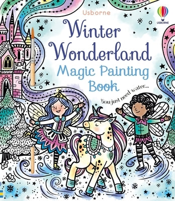 Open paperback of Winter Wonderland Magic Painting Book by Usborne Books with colorful winter holiday illustrations for kids.