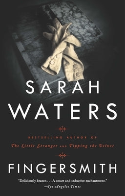 Paperback of Fingersmith novel by Riverhead Books featuring the book cover with intricate artwork and title text.