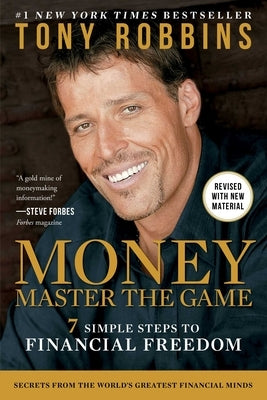 Paperback of Money Master the Game: 7 Simple Steps to Financial Freedom by Simon & Schuster, with a cover featuring the book's title.