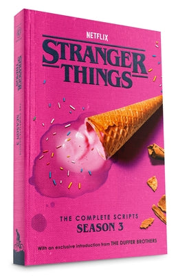 Paperback copy of Stranger Things: The Complete Scripts, Season 3 by Random House Worlds, showing the book cover with title and artwork.