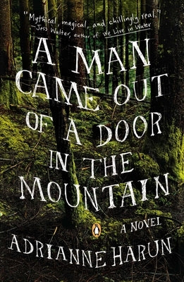 Paperback book titled "A Man Came Out of a Door in the Mountain" by Penguin Books, showing the cover with mountain scenery.