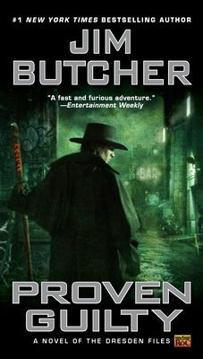 Mass market paperbound copy of Proven Guilty novel by Ace Books, showing the book cover with title and author details.