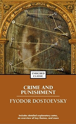 Mass market paperbound of Crime and Punishment by Simon & Schuster, showing the book cover with title and author details.