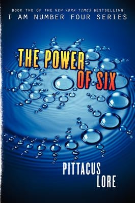 Paperback of "The Power of Six" by HarperCollins, featuring the book cover with title and author details.
